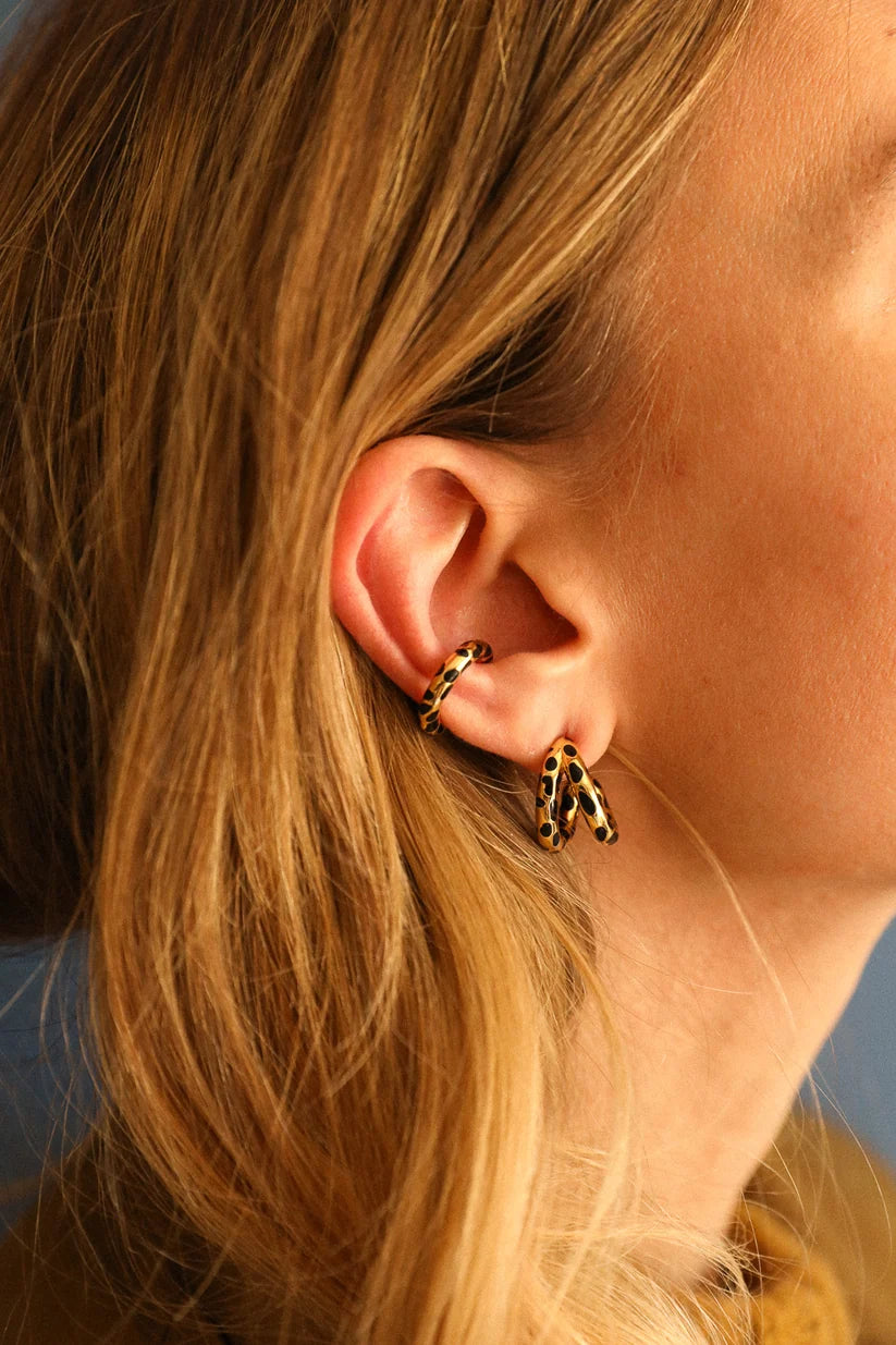 Paire de boucles d'oreilles Léopard asymétriques dorées