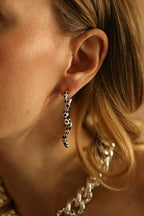 Paire de boucles d'oreilles Léopard asymétriques argentées