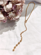 Collier Maille boules dorées
