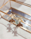 Boucle d'oreille créole Télya feuille dorée