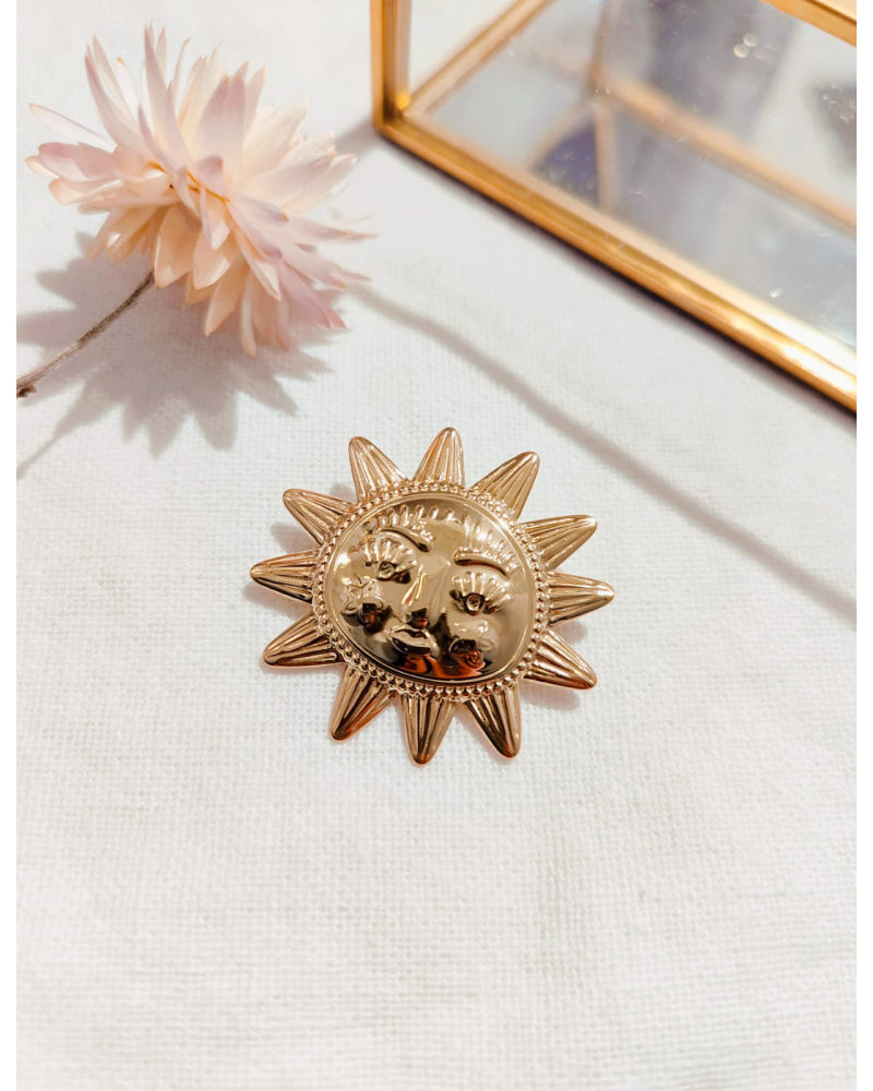 Broche soleil doré