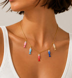 collier pampille poisson porté