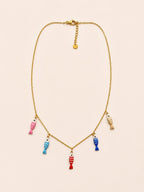 collier pampille poisson rose