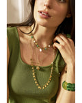 Collier triple rang breloques doré