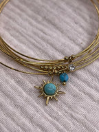 Semainier fin acier doré (7 bracelets), soleil et pierres