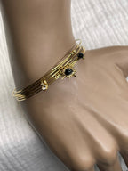Semainier fin acier doré (7 bracelets), soleil et pierres