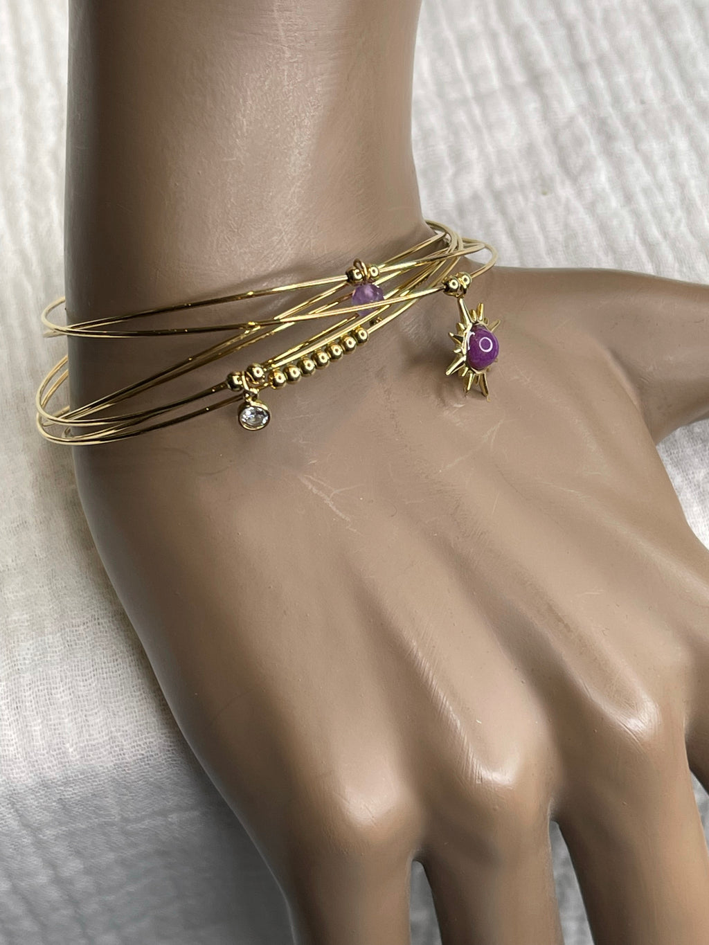 Semainier fin acier doré (7 bracelets), soleil et pierres