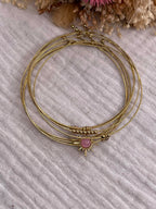 Semainier fin acier doré (7 bracelets), soleil et pierres