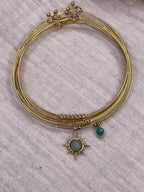 Semainier fin acier doré (7 bracelets), soleil et pierres
