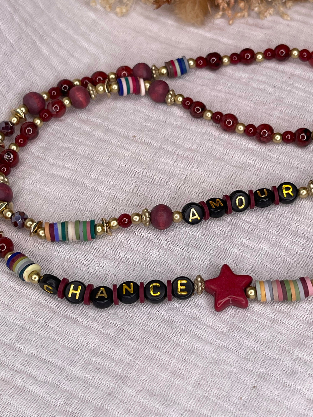 Bijou de téléphone long, "Amour - Chance"