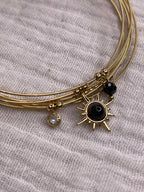 Semainier fin acier doré (7 bracelets), soleil et pierres