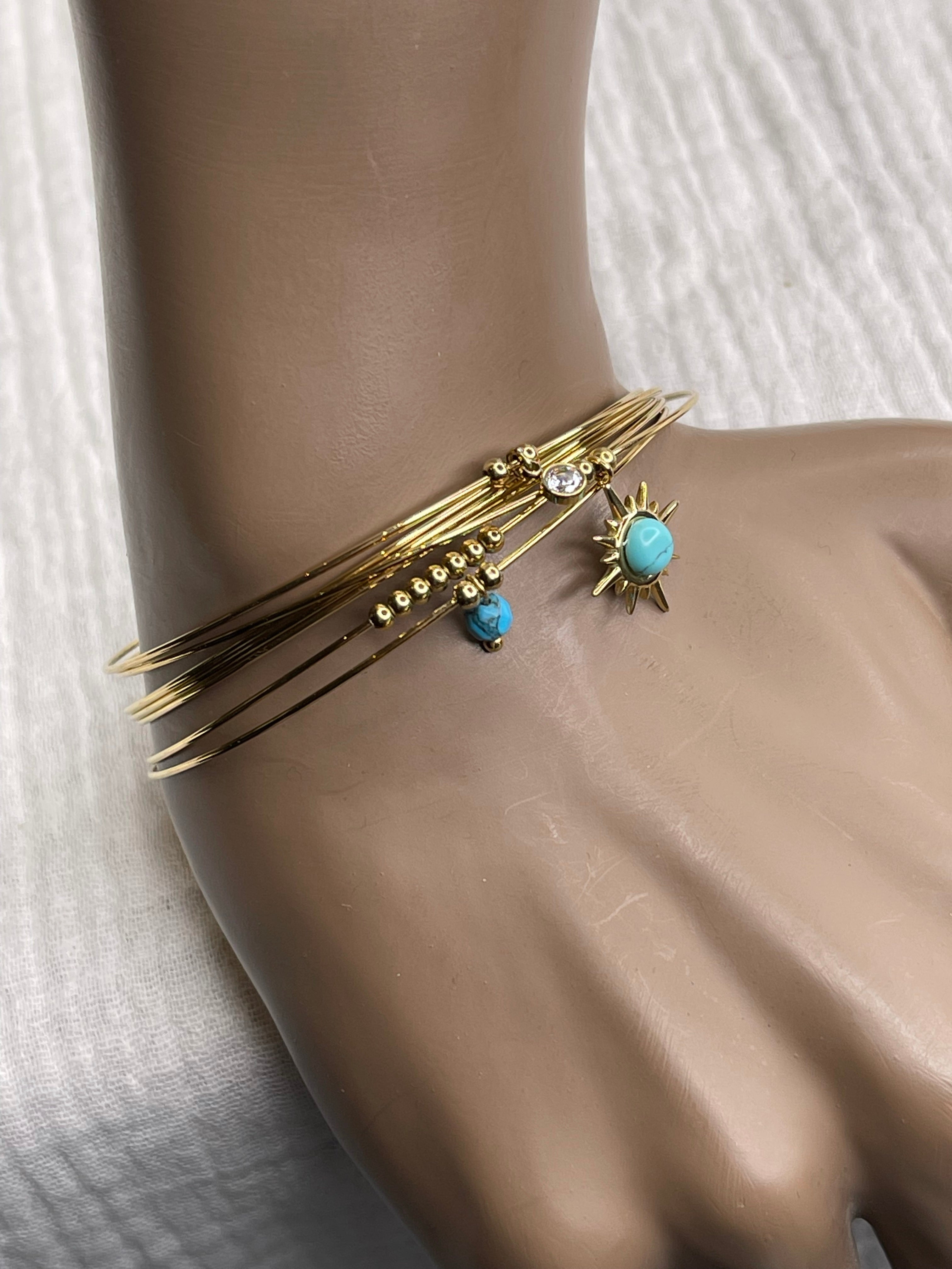 Semainier fin acier doré (7 bracelets), soleil et pierres